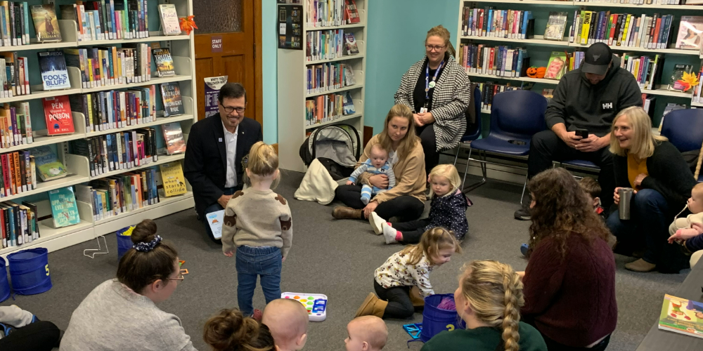 Warden Marriott participates in a Storytime program at the Oil Springs Library in October 2023