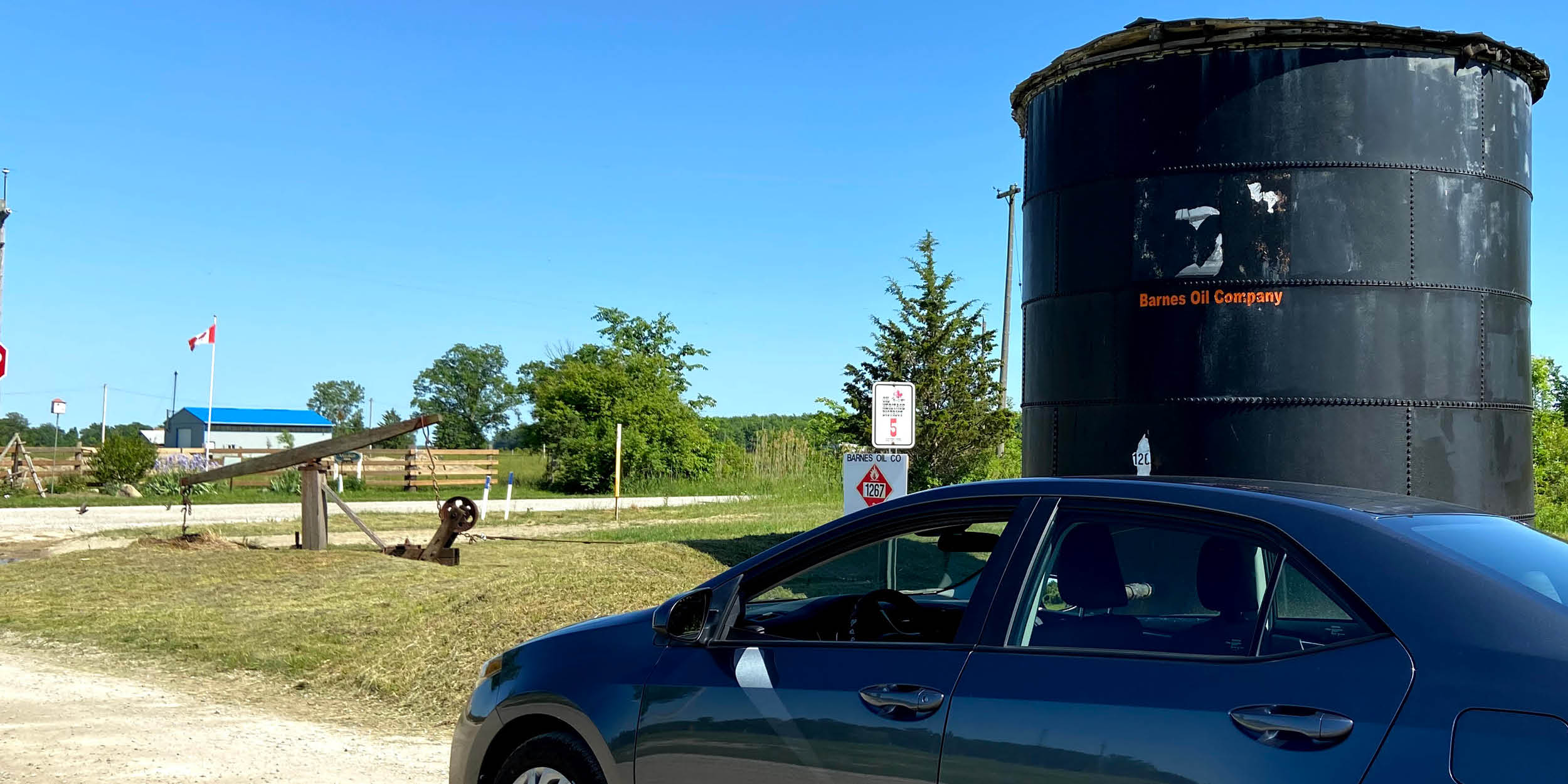 Car parked at a location on the Oil Museum's audio tour