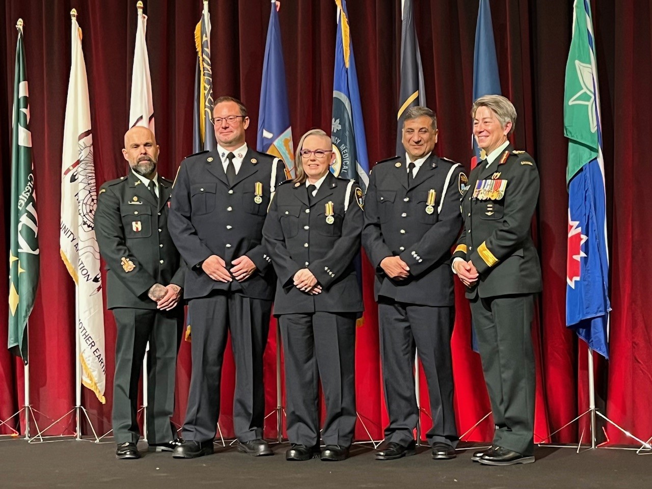 Lambton EMS staff accept Exemplary Service Medals at the Ontario Association of Paramedic Chiefs Gala