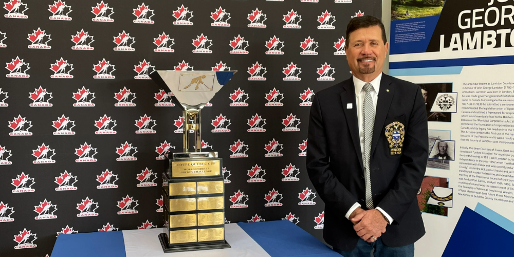 Warden Kevin Marriott with the World U17 Challenge Cup at the Lambton County Administration Building